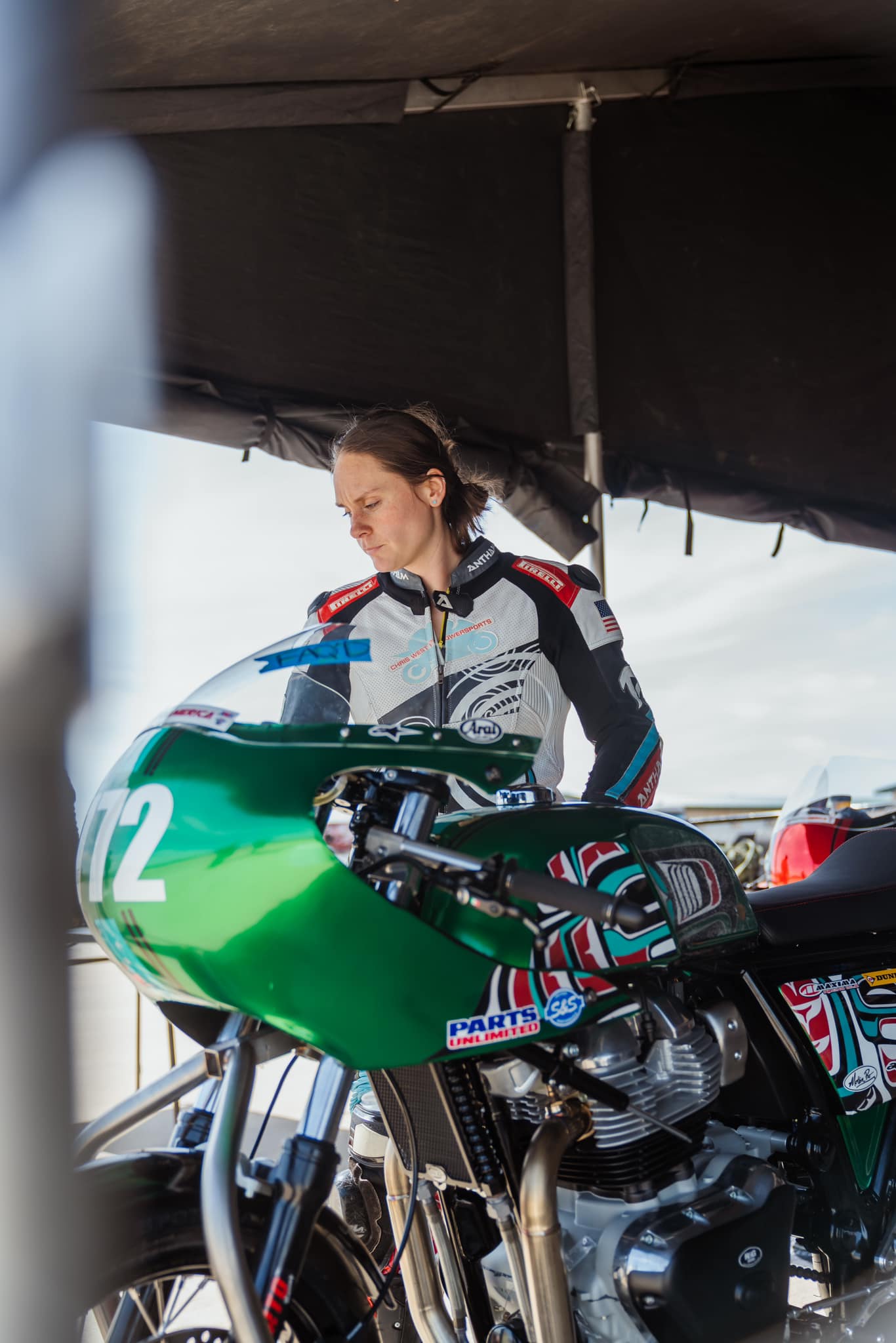 Kate West with her Royal Enfield Continental GT 650 race bike in the MotoAmerica paddock
